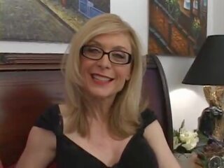 Lustful Nina Hartley goes down and gives groovy blowjob
